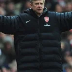 arsene-wenger-coat.webp