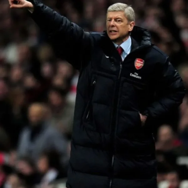 arsene-wenger-long-coat.webp