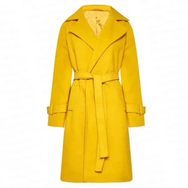 elisabeth-sparkle-the-substance-yellow-coat.webp