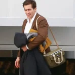 jake-gyllenhaal-presumed-innocent-brown-coat.webp
