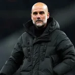 pep-guardiola-black-puffer-jacket.webp