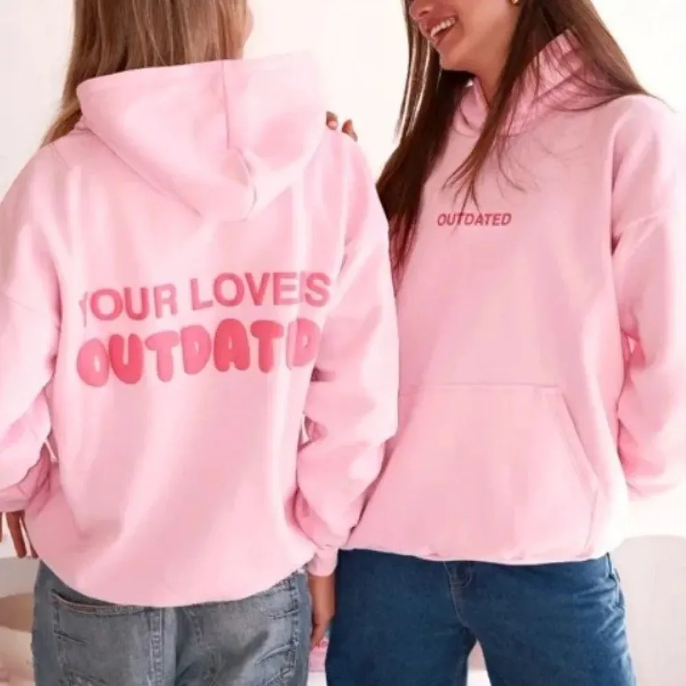 your-love-is-outdated-pink-hoodie.webp