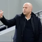 coach-arne-slot-black-coat.webp