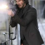 keanu-reeves-black-coat.webp
