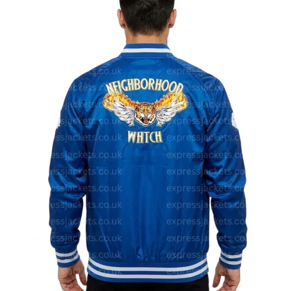 the-watch-blue-jacket.webp