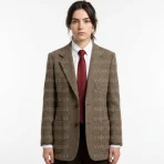rowan-atkinson-brown-coat.webp